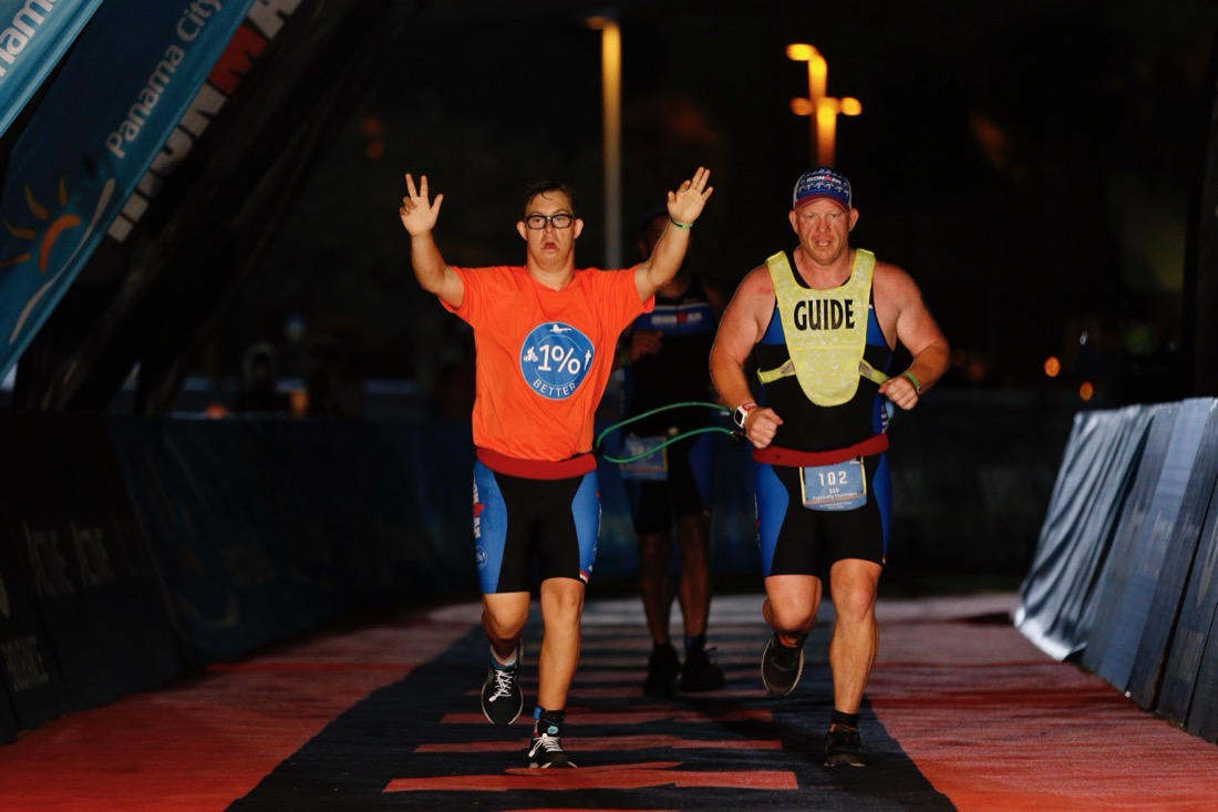 Chris Nikic crossing the Ironman Florida finish line